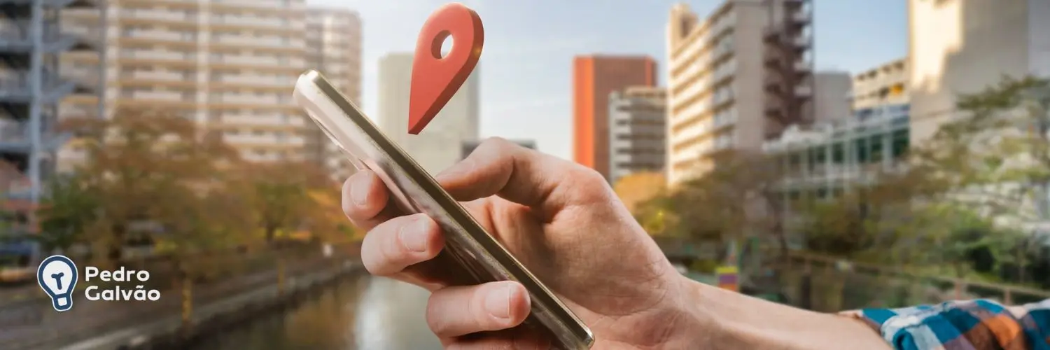 Imagem ilustrando mão segurando celular fazendo pesquisa por negócio local e pin de localização "saindo" do celular